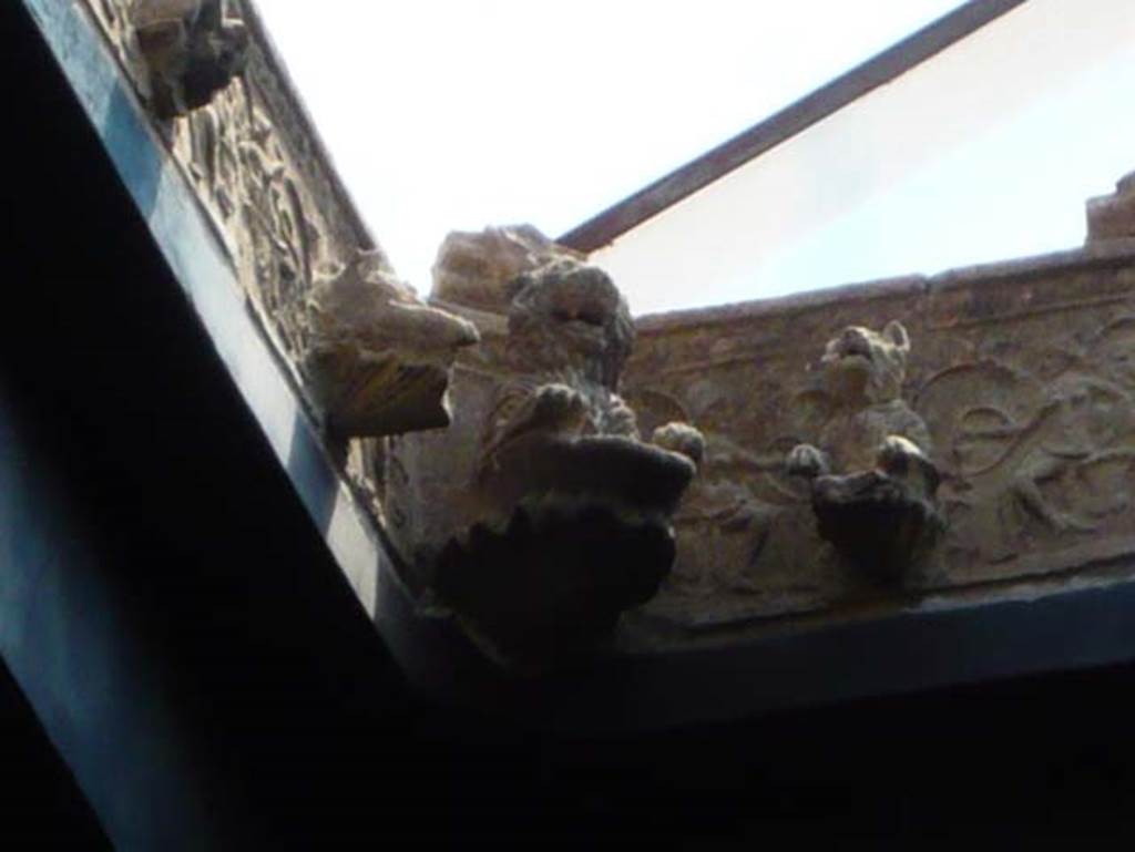 III.11 Herculaneum. August 2013. Room 6, detail of water-spouts in compluvium.
Photo courtesy of Buzz Ferebee.